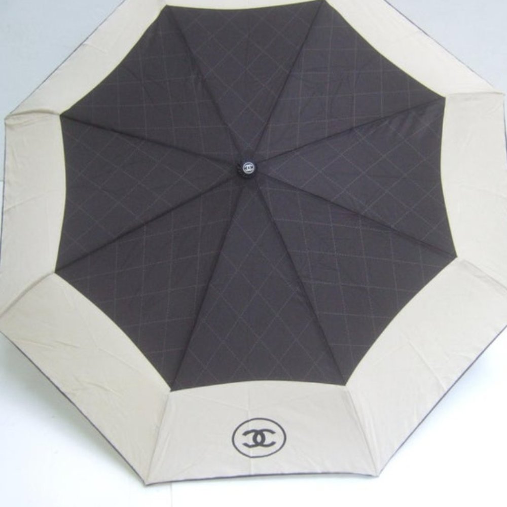 Authentic Chanel nylon umbrella with quilted storage bag and Chanel box 21st C